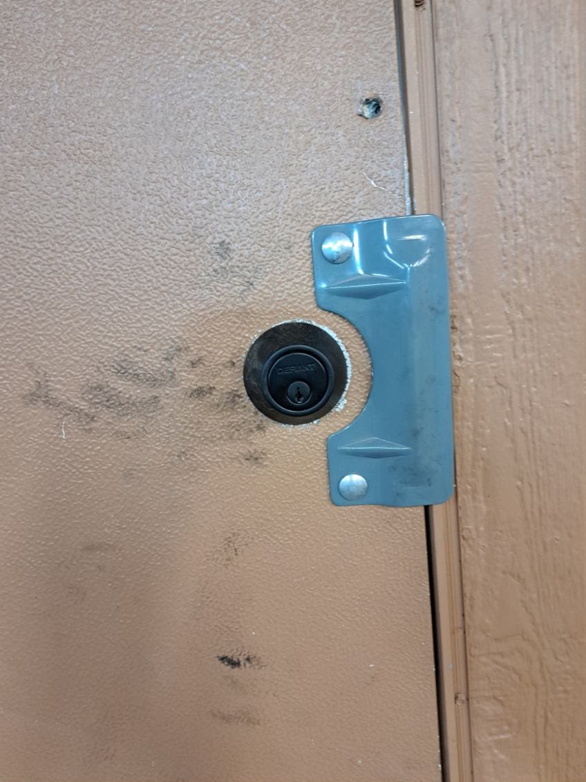 New keypad deadbolt installed on a residential door in Albuquerque